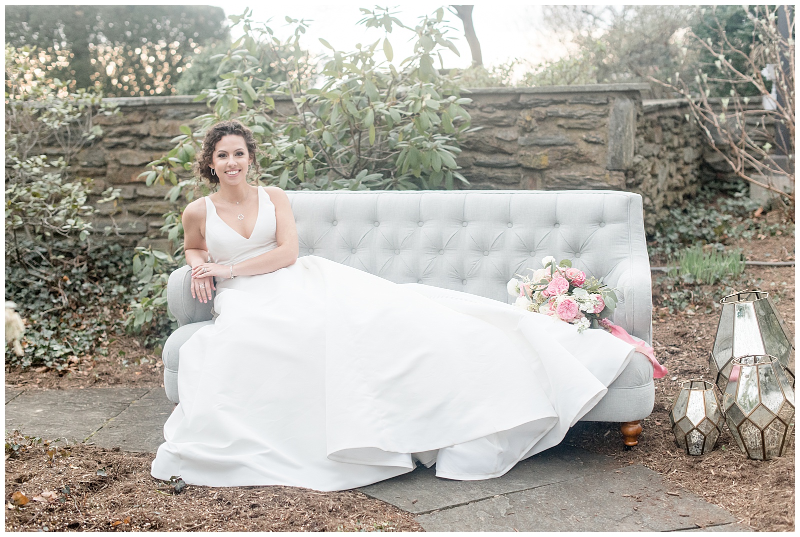 bride on gray couch from Treasured Events
