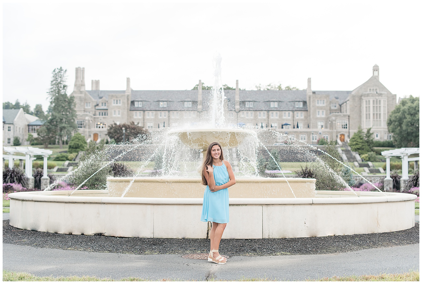 senior girl in front of fountain at gardens of Masonic Village