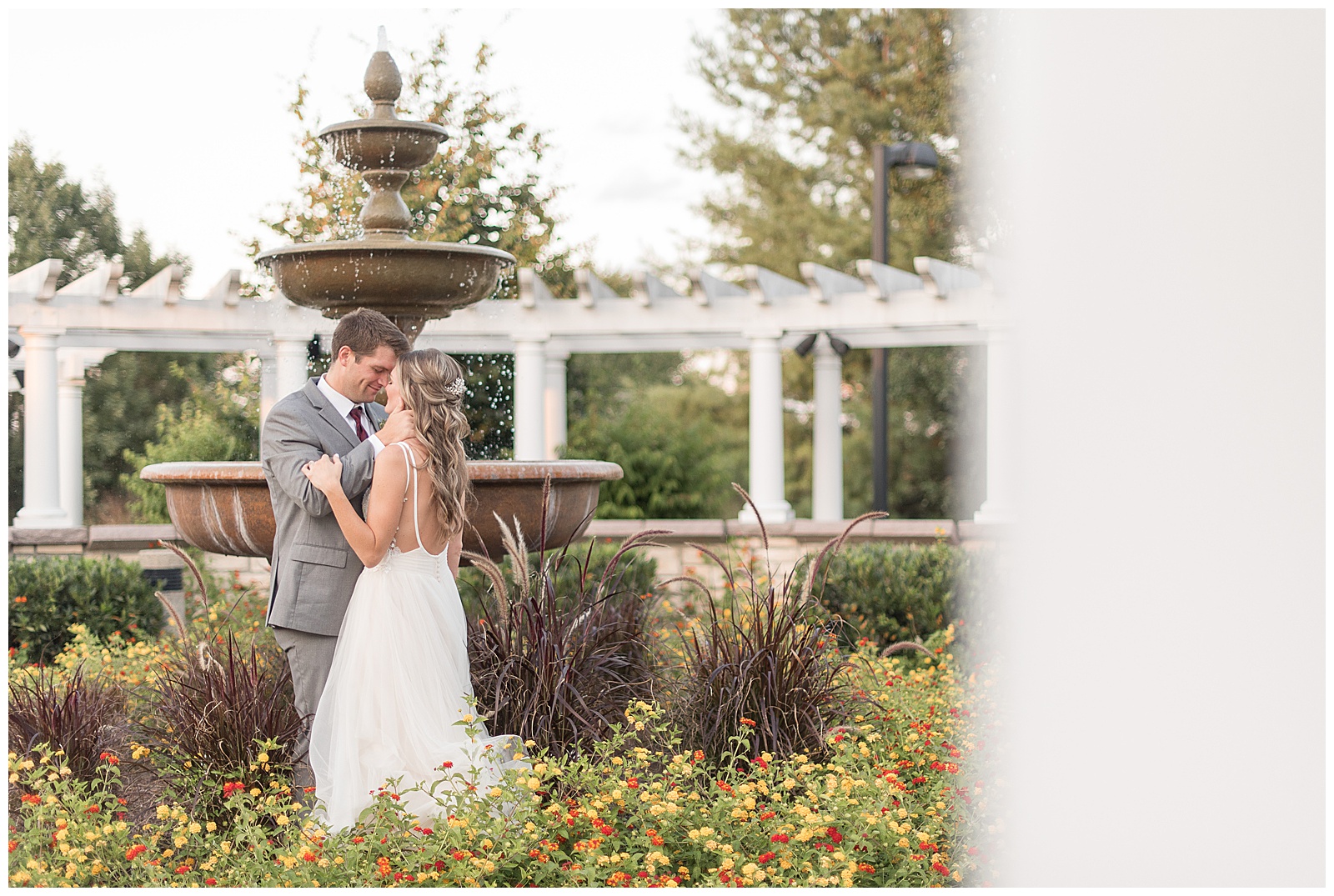 sunset photos at Purcell Friendship Hall surrounded by colorful flowers and fountain