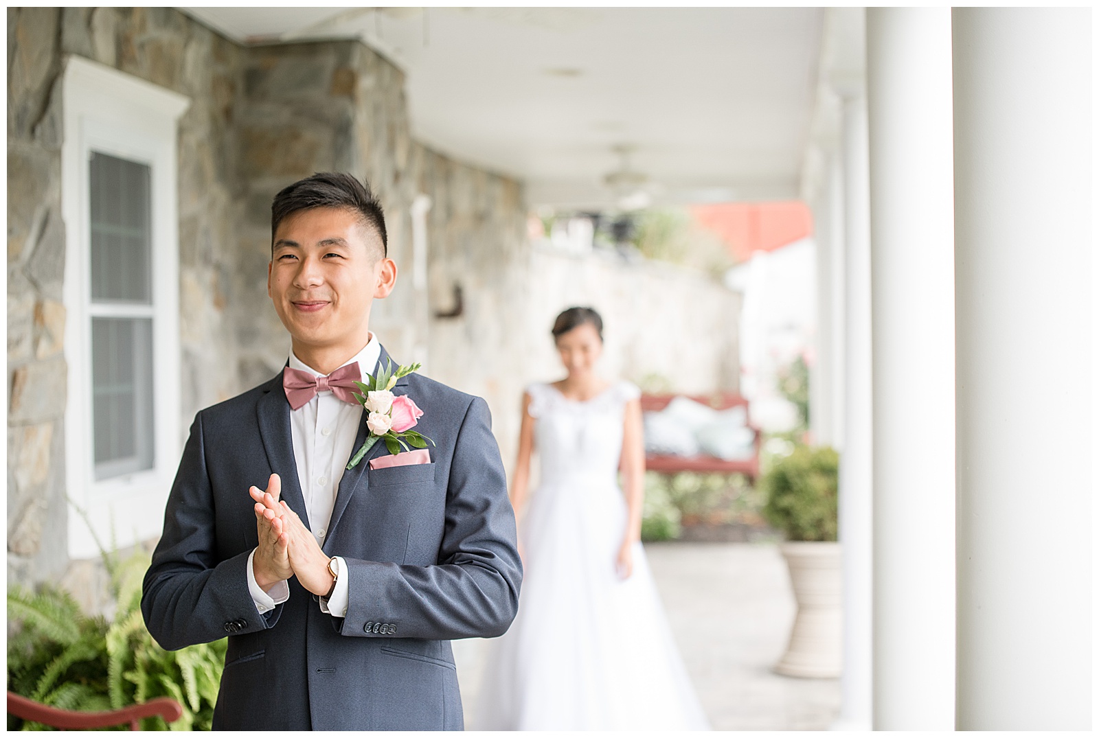 groom anxiously awaiting as bride walks up behind for first look