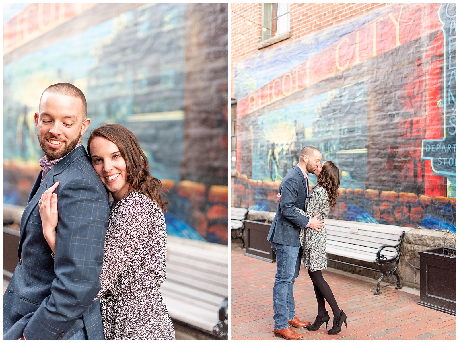 couple standing in front of mural of Ellicott City, Maryland sharing a kiss for their engagement session