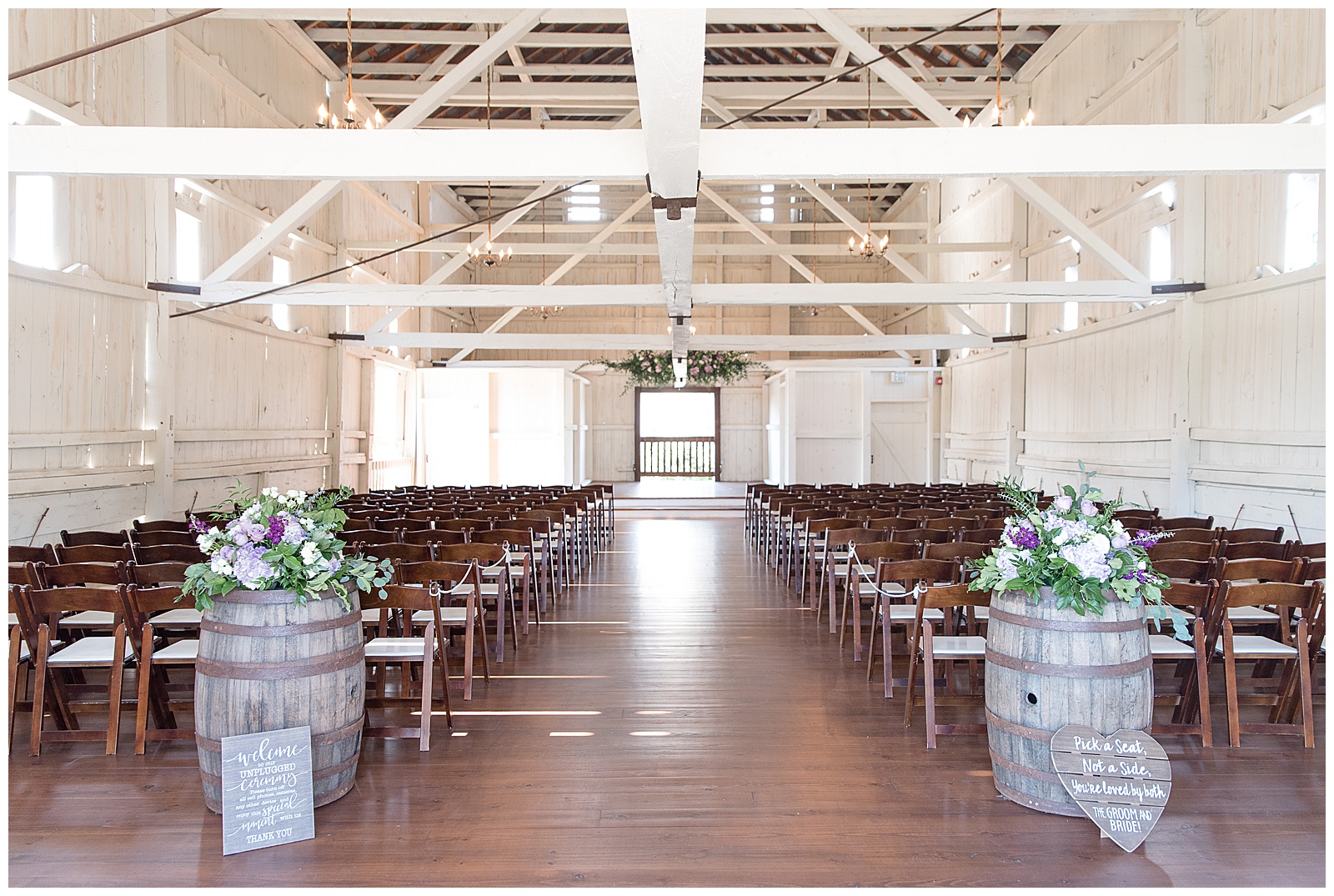 white barn ceremony space at Stoltzfus Homestead and Gardens