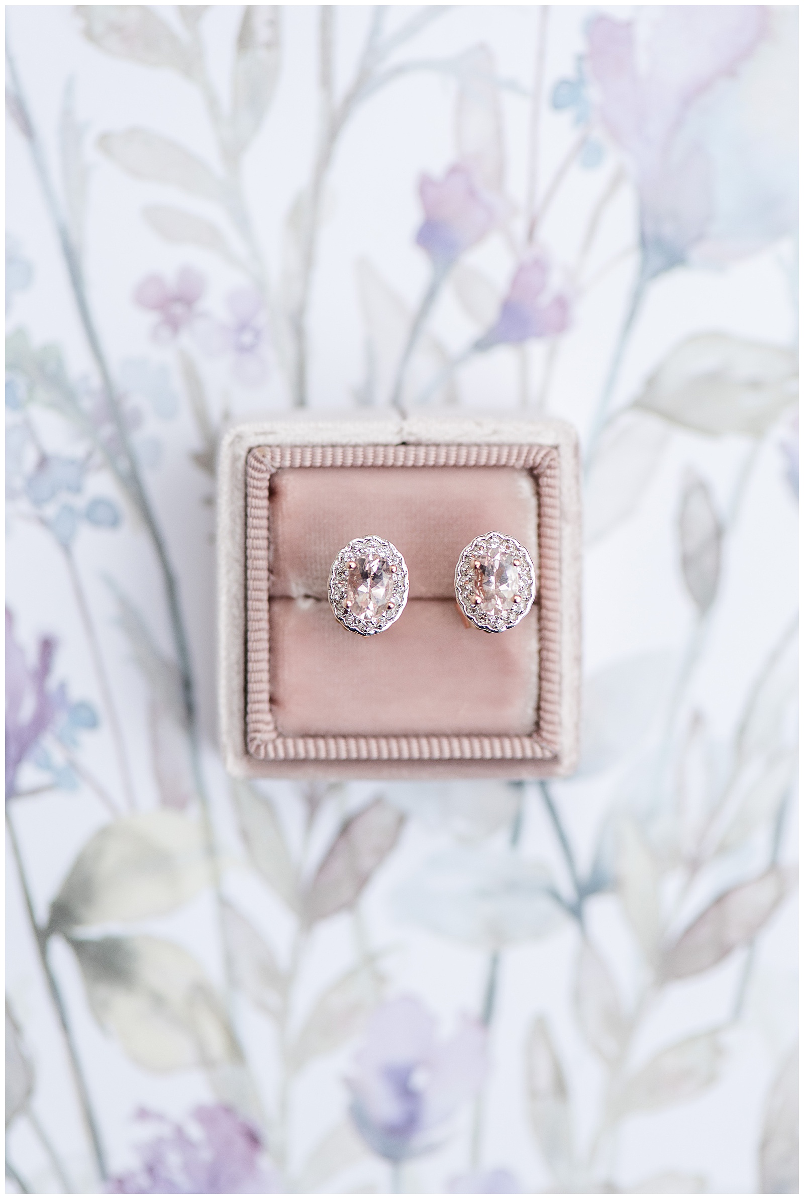 diamond earrings displayed in blush box on beautiful floral background in lancaster pennsylvania