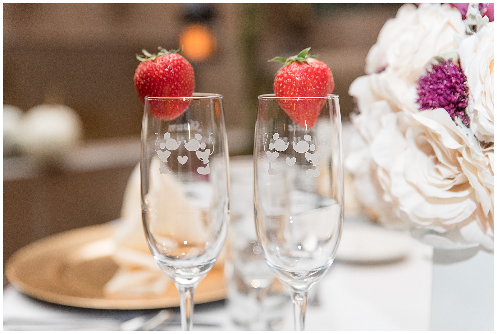strawberries displayed on champagne glasses during reception