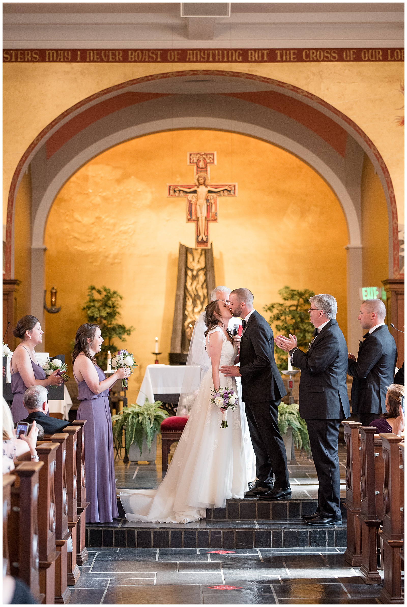 first kiss during wedding ceremony at the Shrine of Saint Anthony
