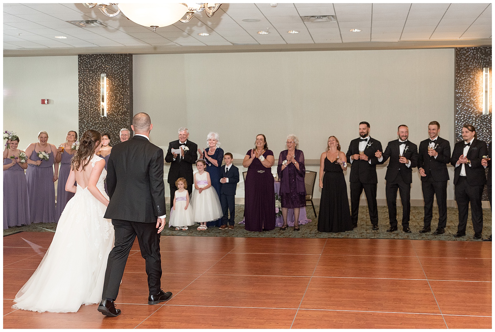bride and groom introduced into the reception space at Turf Valley Resort