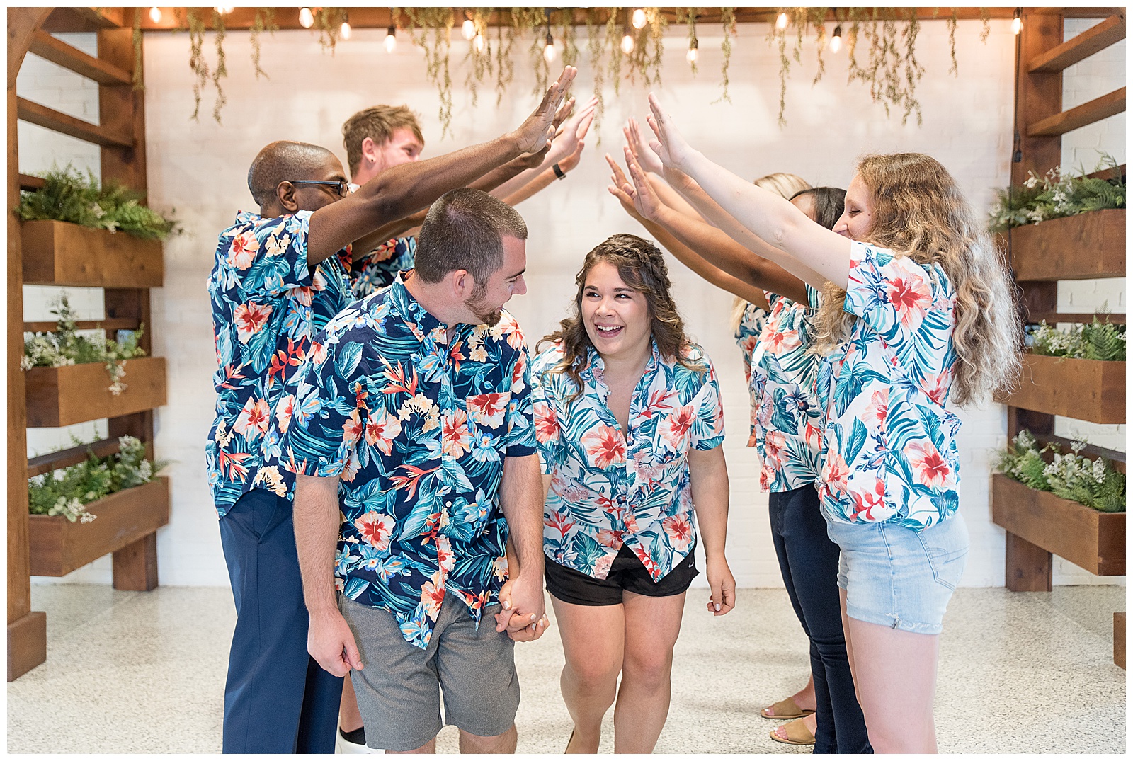 full bridal party in Hawaiian shirts at the silk mill on main 