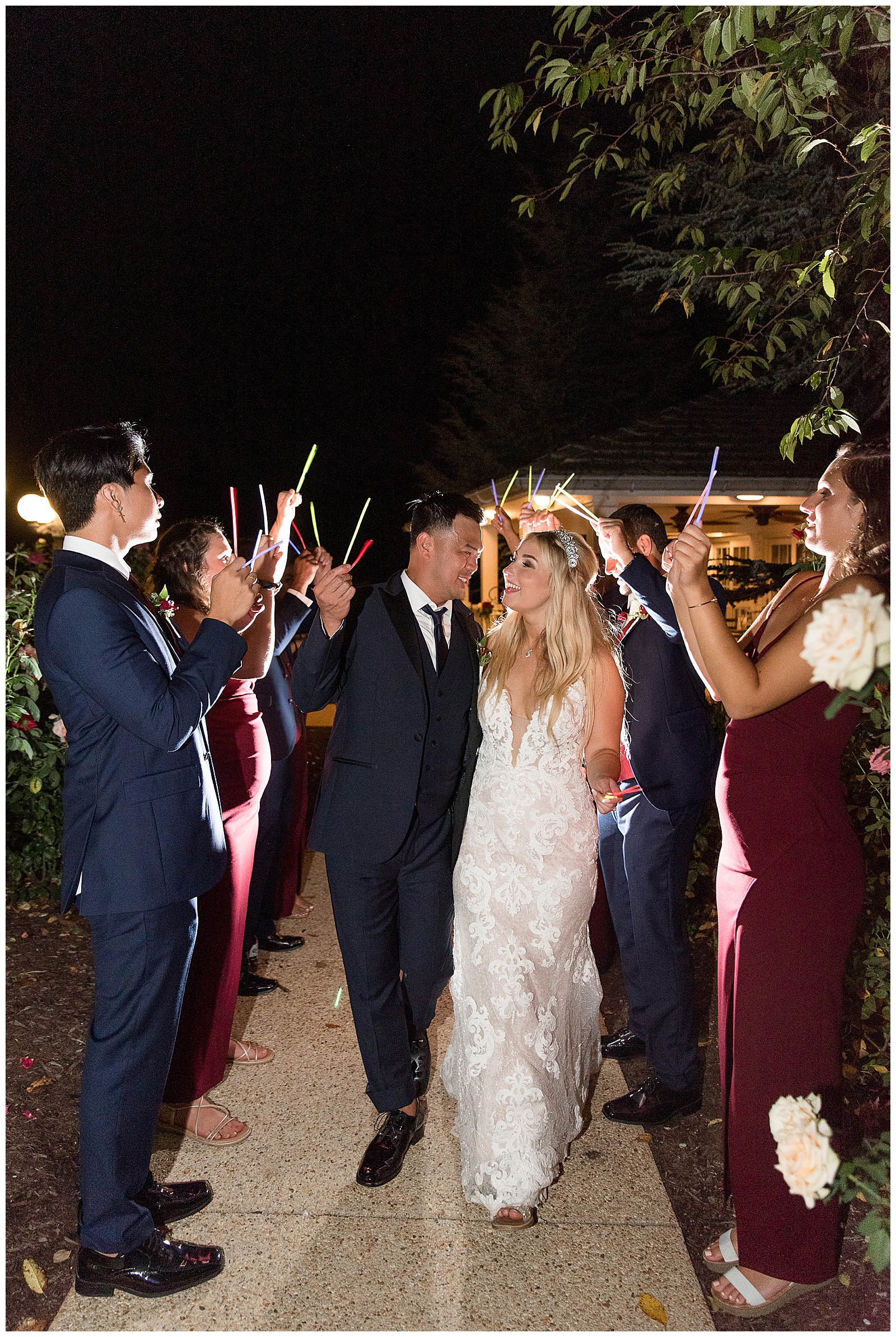 bride and groom leaving their wedding and reception with a sparkler send-off at nighttime at Antrim 1844 in Maryland