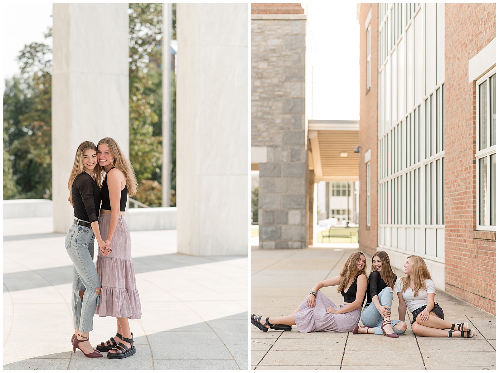 senior girls sitting together and smiling at each other on concrete sidewalk with building behind them