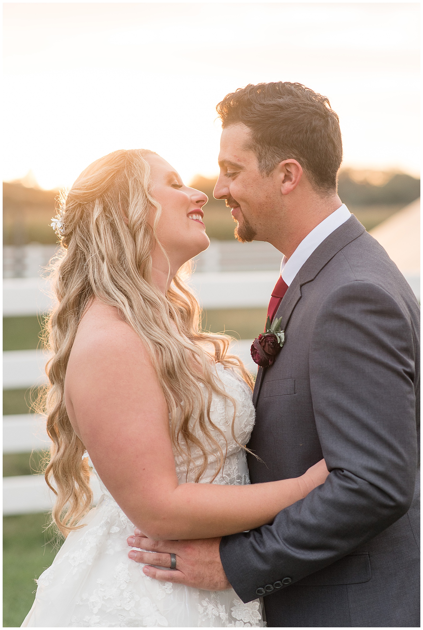 bride and groom almost kissing as the sun sets behind them at the barn at silverstone in lancaster pennsylvania
