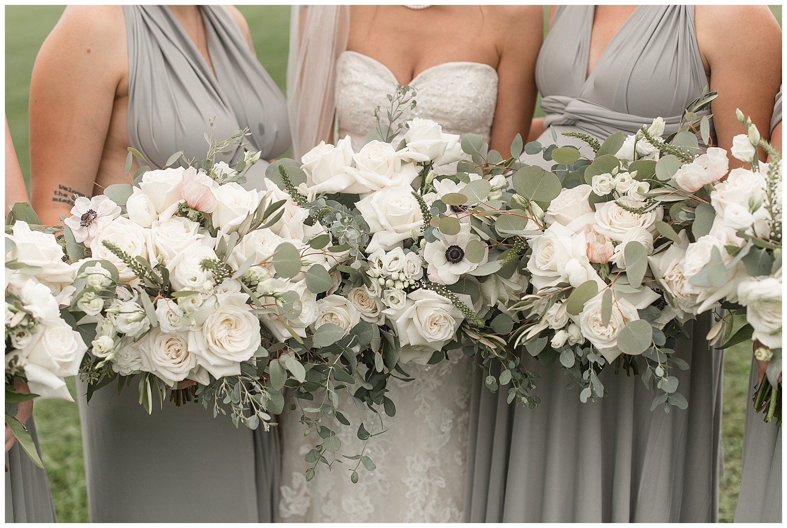 close up photo of white floral bouquets filled with white flowers and eucalyptus at lauxmont farms