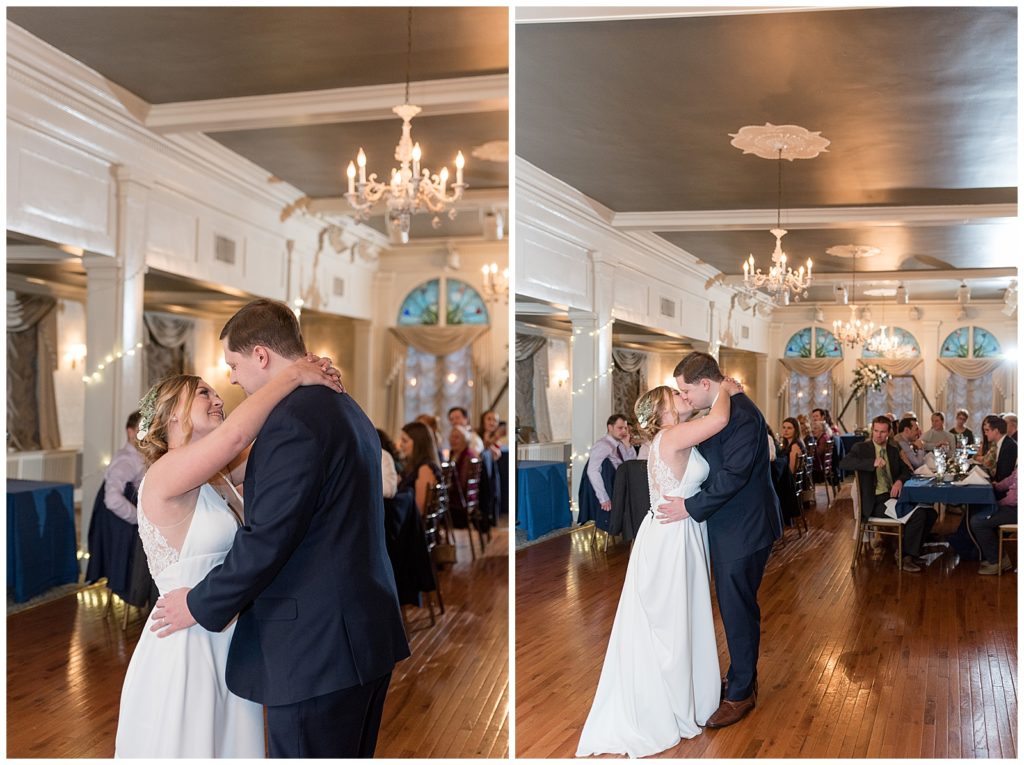 bride and grooming sharing their first dance at ballroom reception with their guests watching