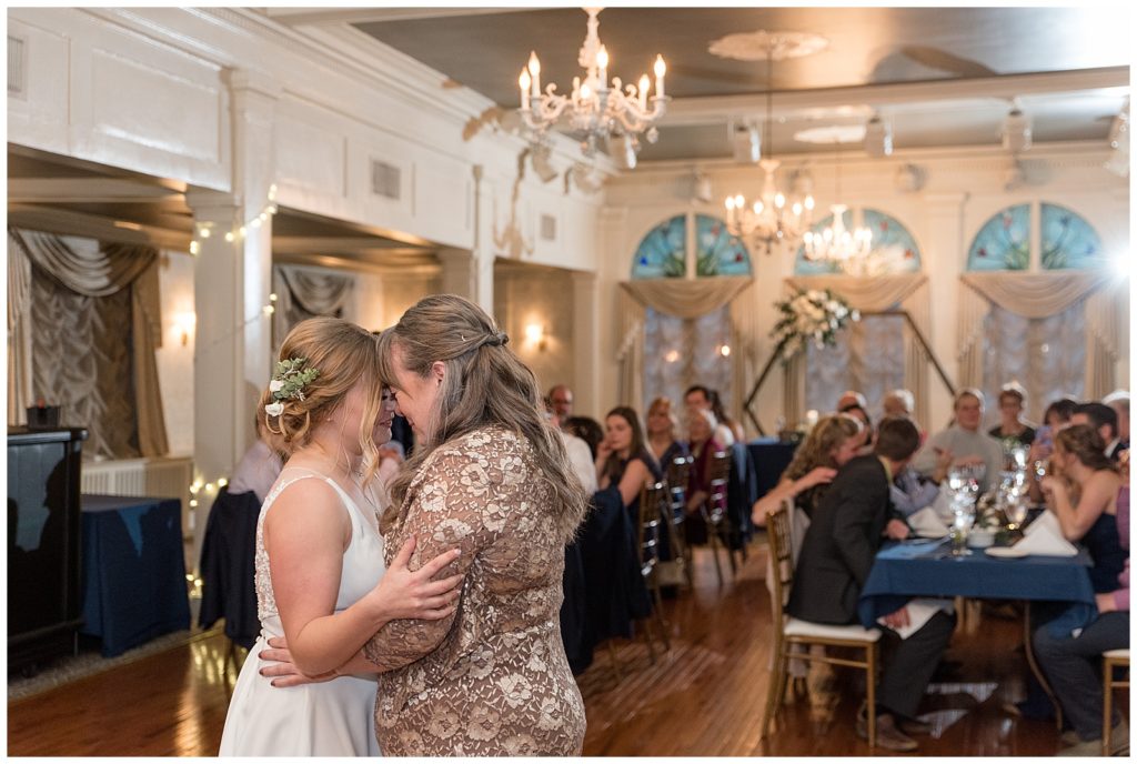 bride sharing her first dance at reception with her mom in beautiful ballroom at lititz springs inn and spa