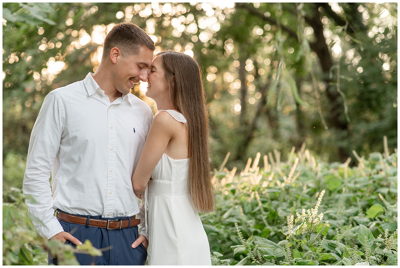 couple standing close with noses touching at sunset for this lancaster county engagement session