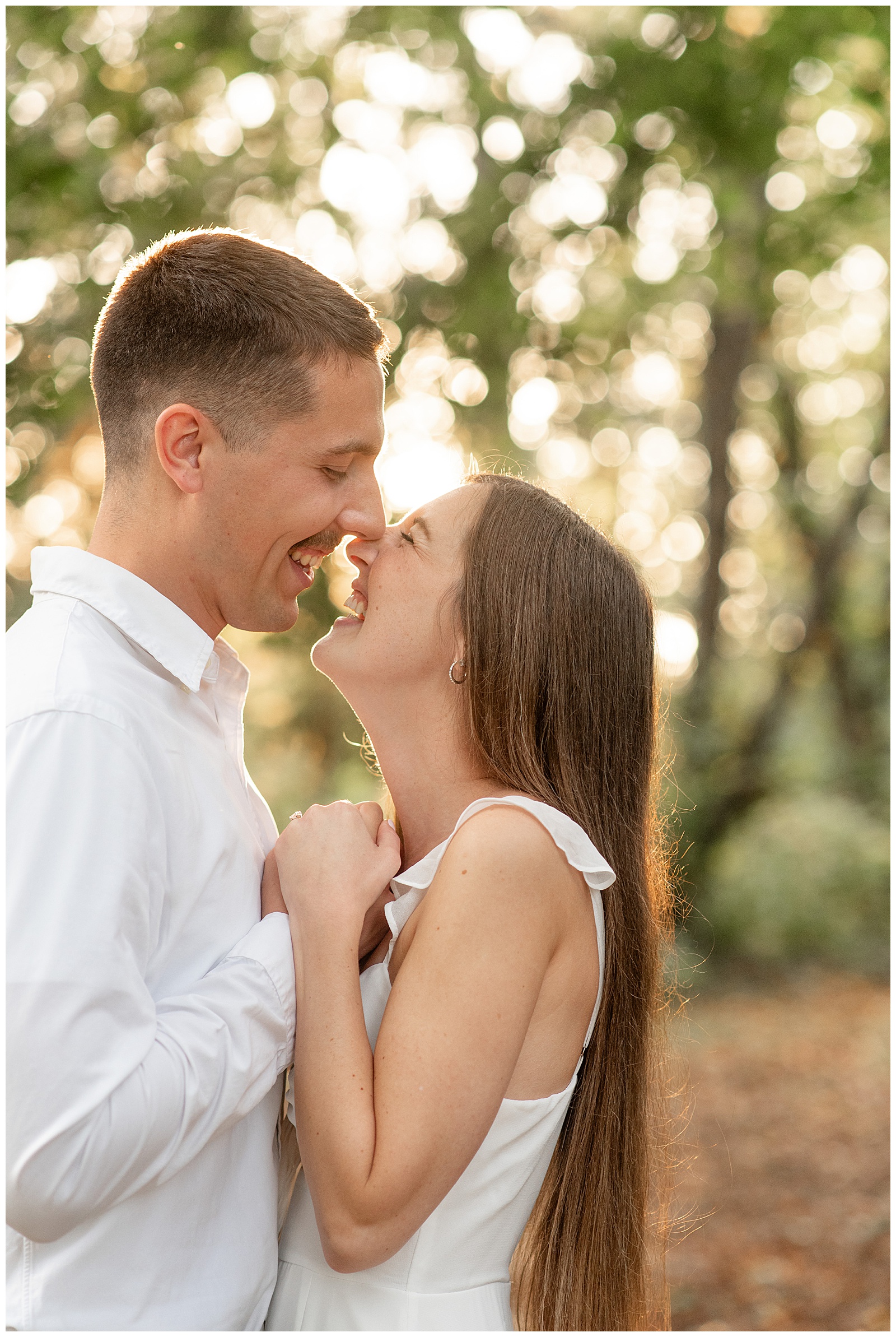engaged couple almost kissing at sunset for this Fall Overlook Park Engagement Session
