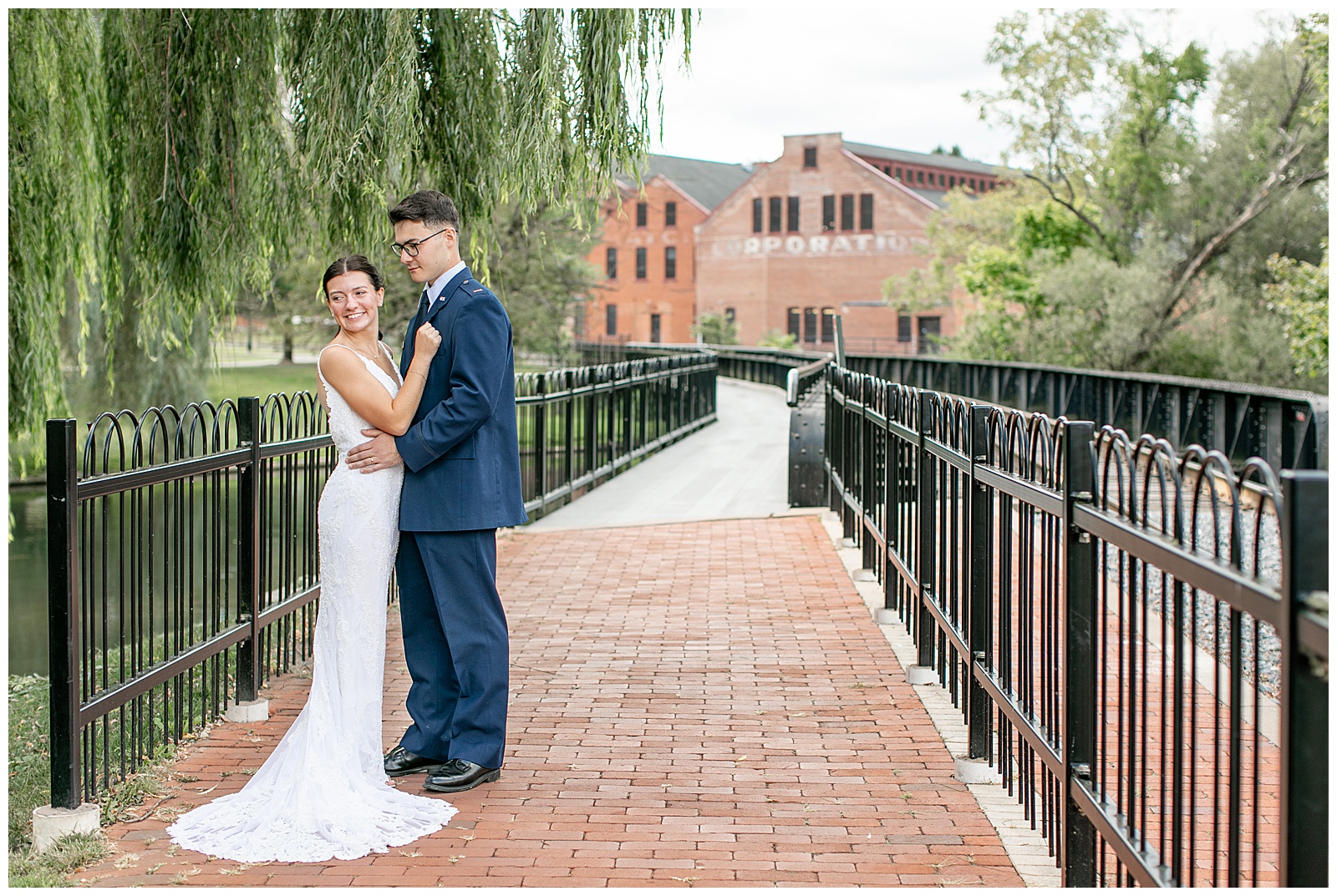 couple standing on brick walkway and looking away from camera for this Intimate Central PA Elopement in Centre County