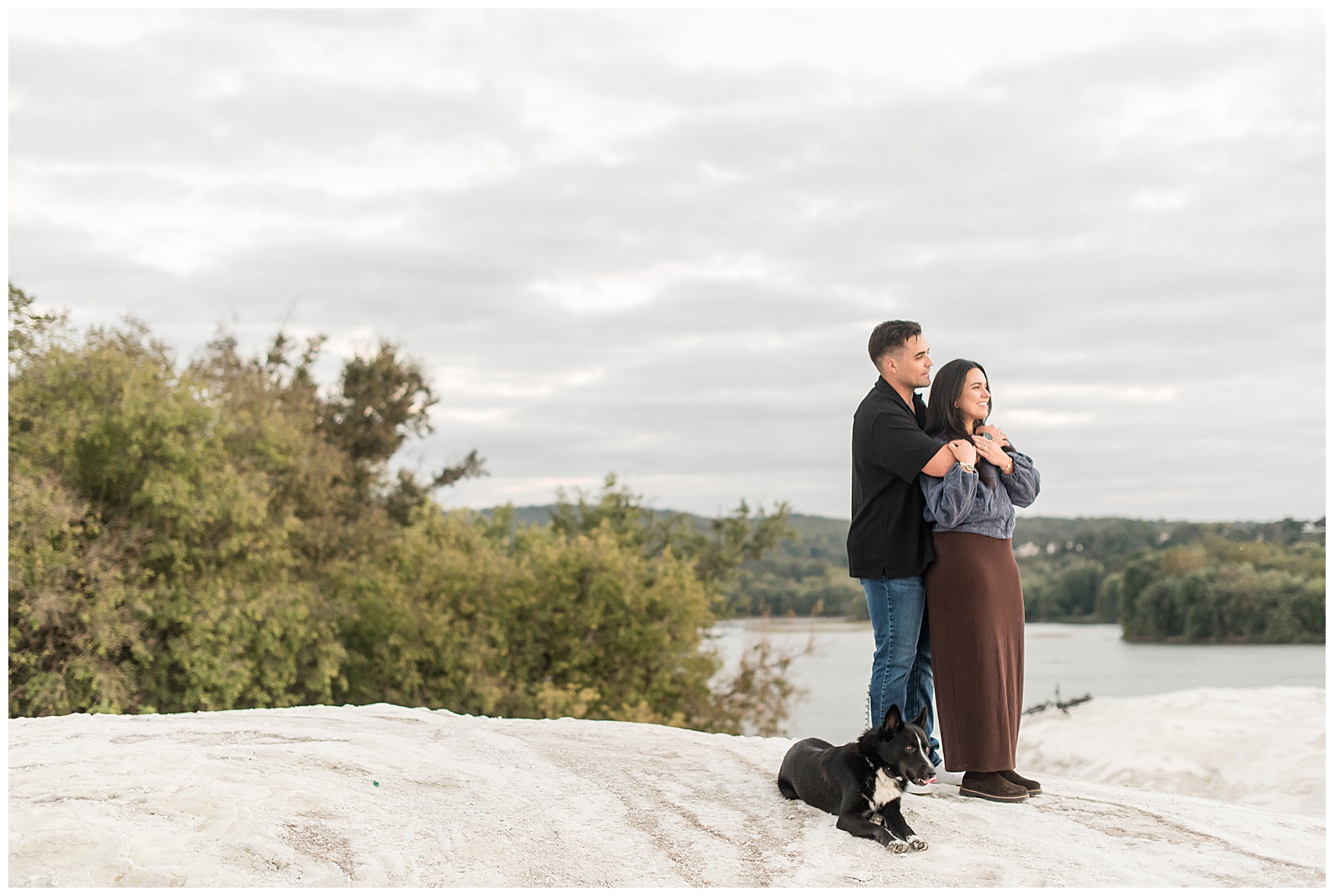 couple standing close and looking off into distance for this White Cliffs of Conoy Fall Couples Session
