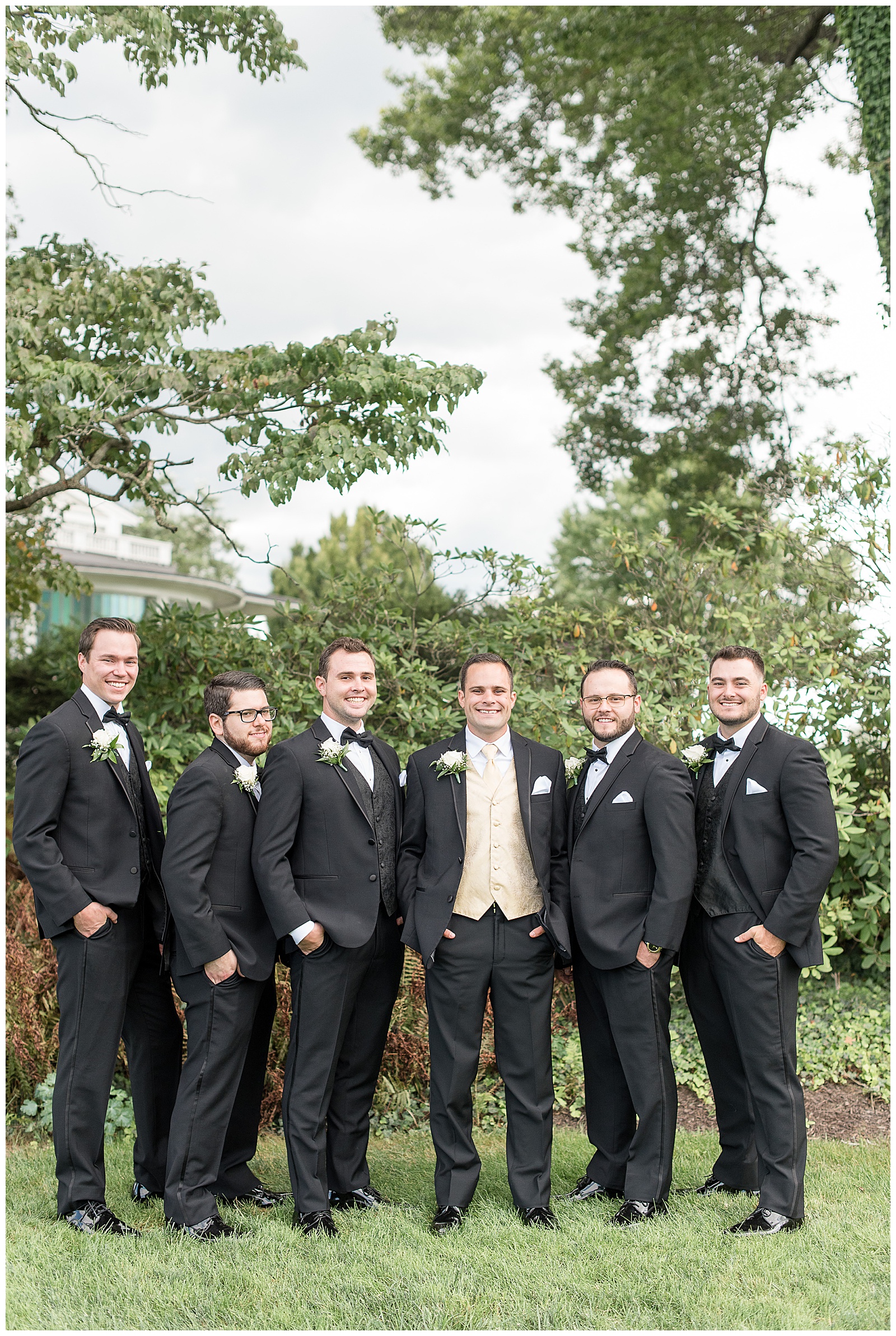groomsmen all standing at camera