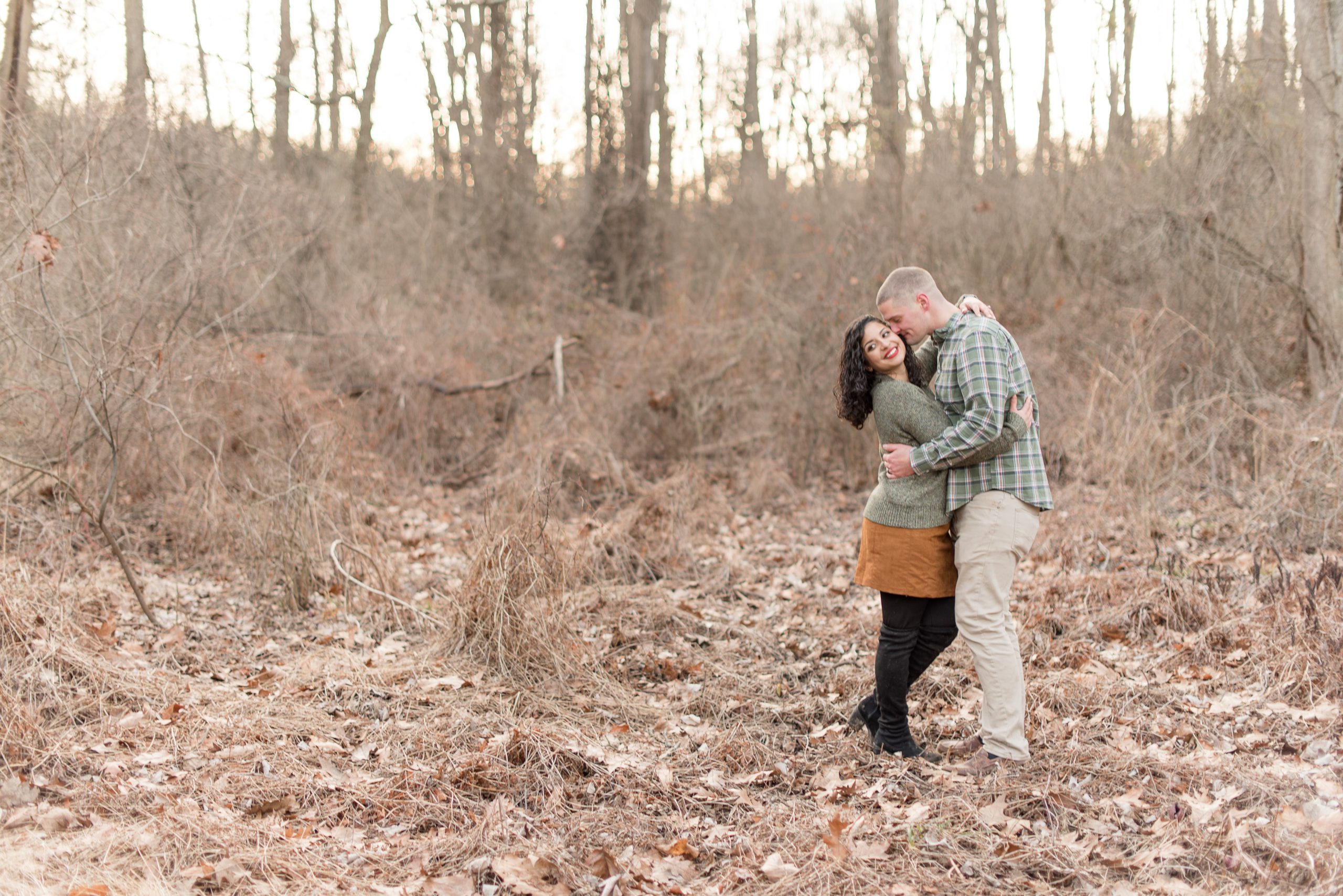 winter engagement session in the woods