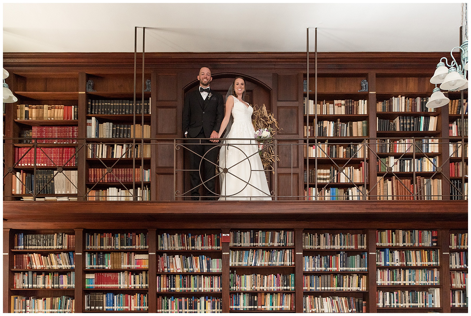 bride and groom portraits in the library at the Shrine of Saint Anthony