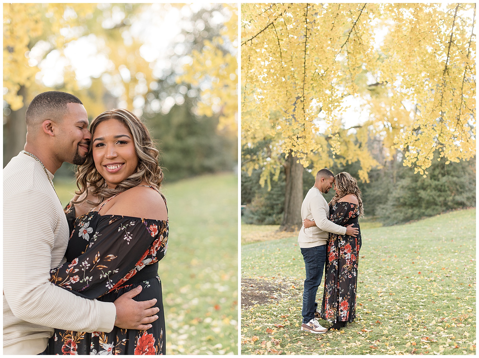 engaged couple standing close with arms around each other as woman smiles at camera under beautiful fall tree with yellow leaves