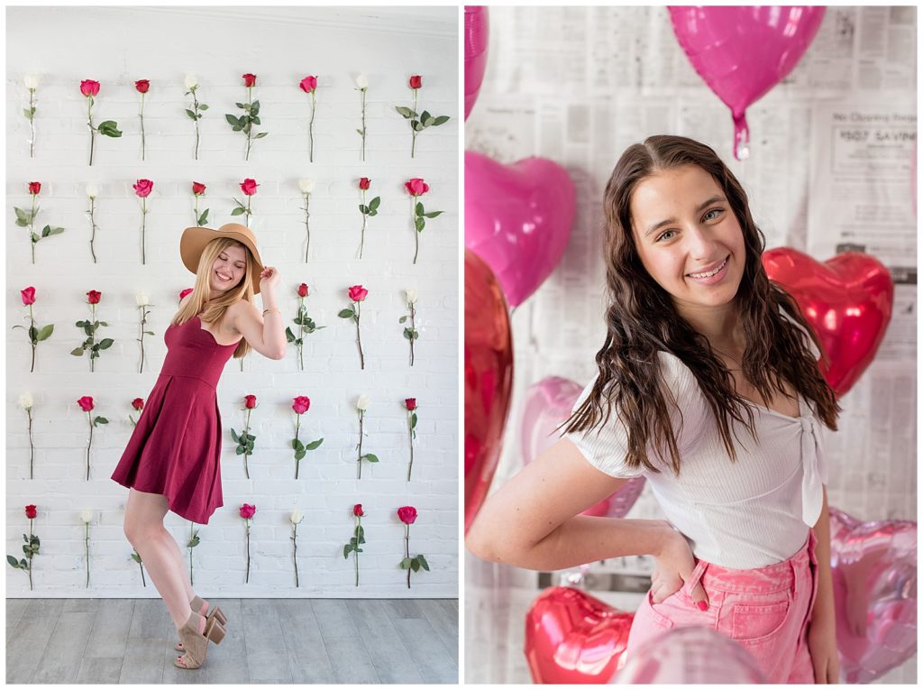 senior girls leaning back and smiling at camera in front of valentine's roses and balloons