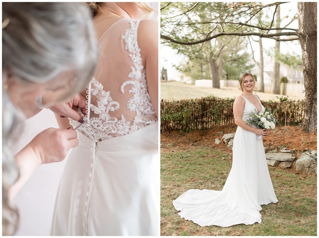 mother of the bride helping to button up the back of bride's white lace wedding gown