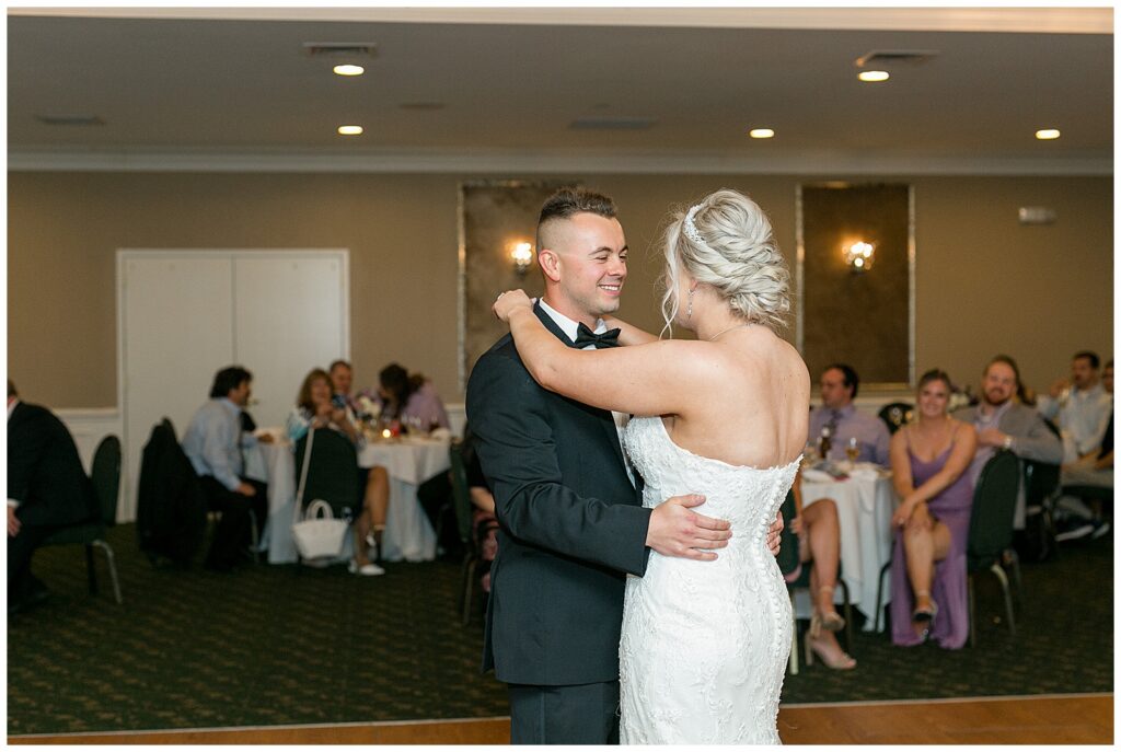 bride and groom share their first dance during reception at the maryland golf and country club