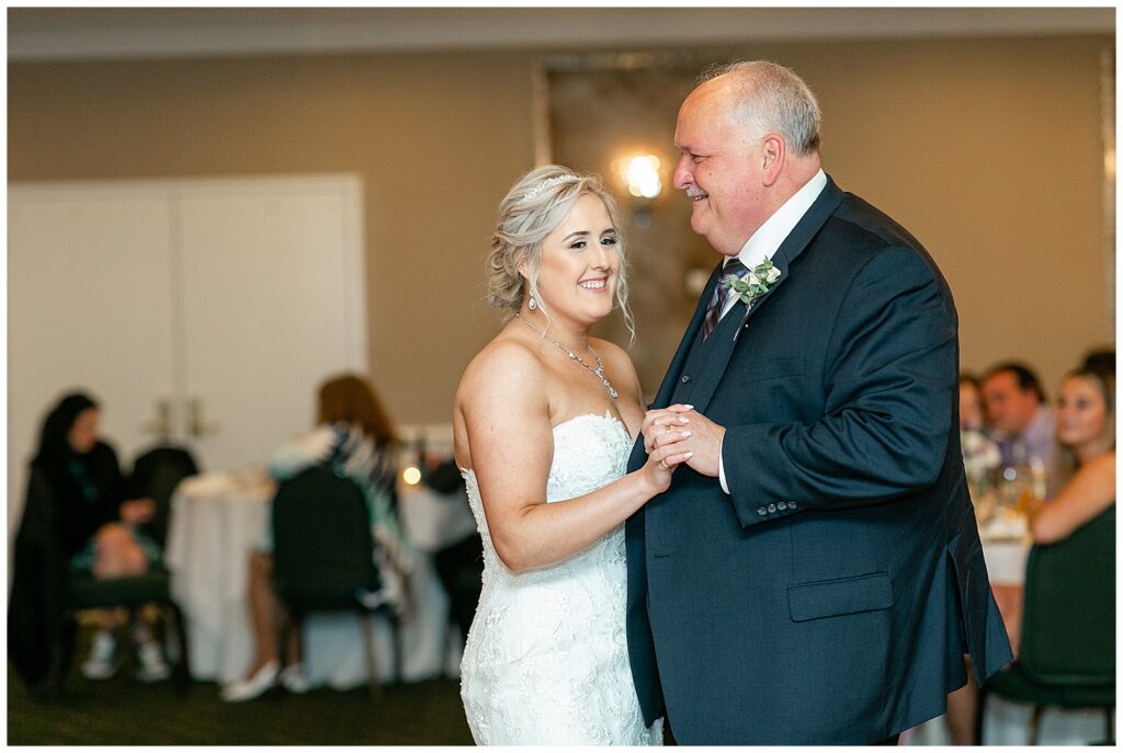 bride and her dad dancing during indoor wedding reception at the maryland golf and country club