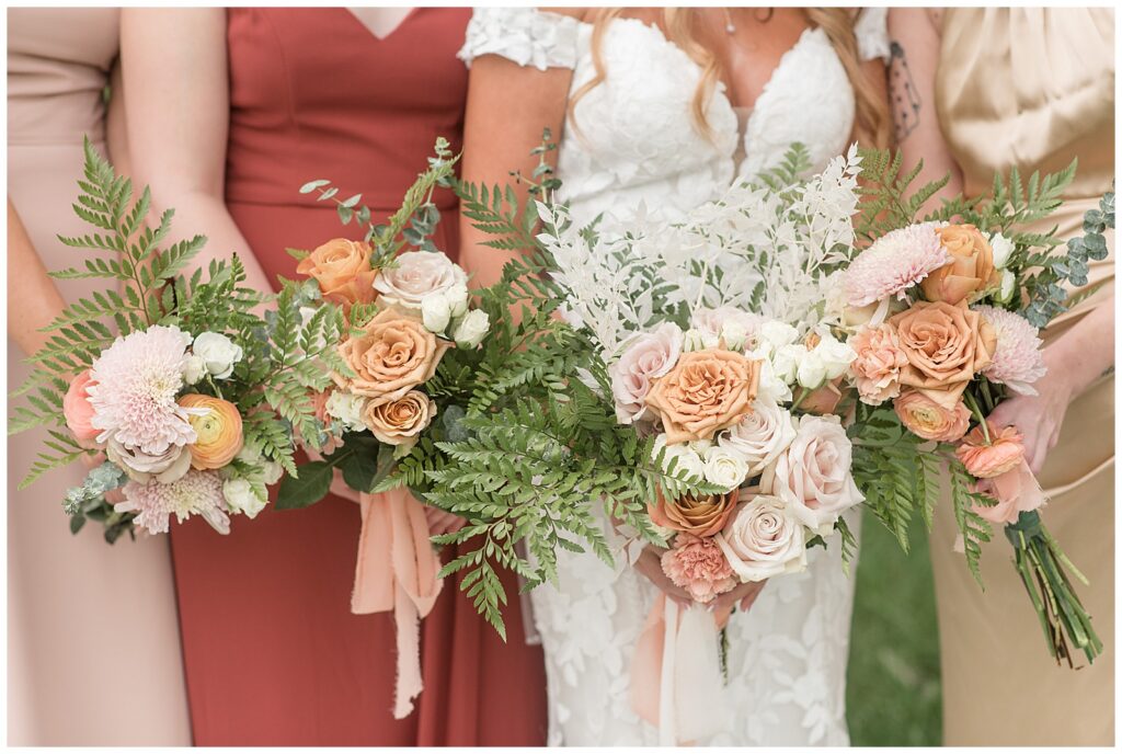 close-up photo of bouquets being held by the bride and bridesmaids at lakefield weddings