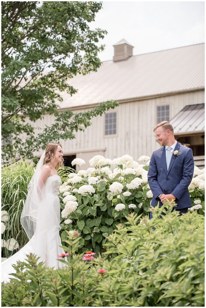 First Look at French Creek Golf Club Wedding. The groom has just turned around to see his bride for the first time