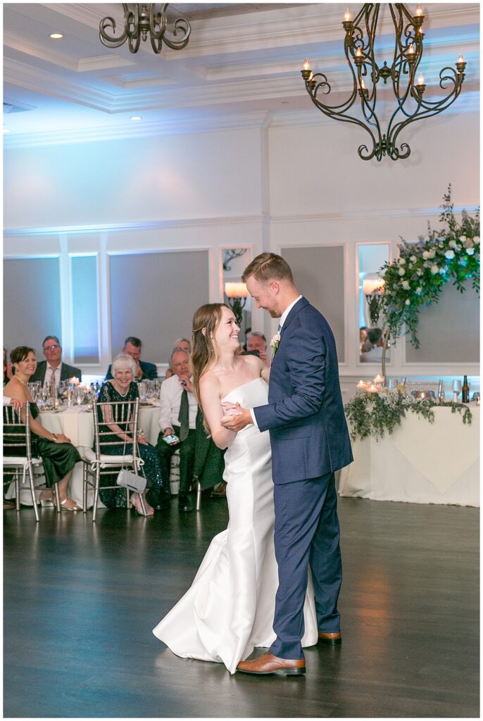 bride and groom share first dance in French Creek Golf Club wedding reception ballroom