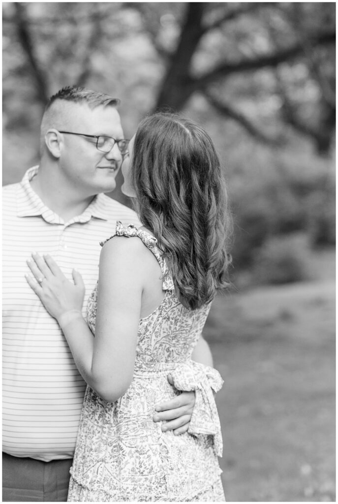 black and white photo of engaged couple almost kissing in lancaster pennsylvania