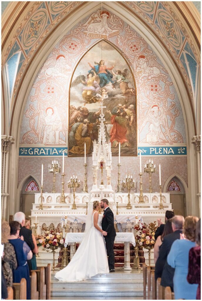 couple share their first kiss at st. mary's church in lancaster city