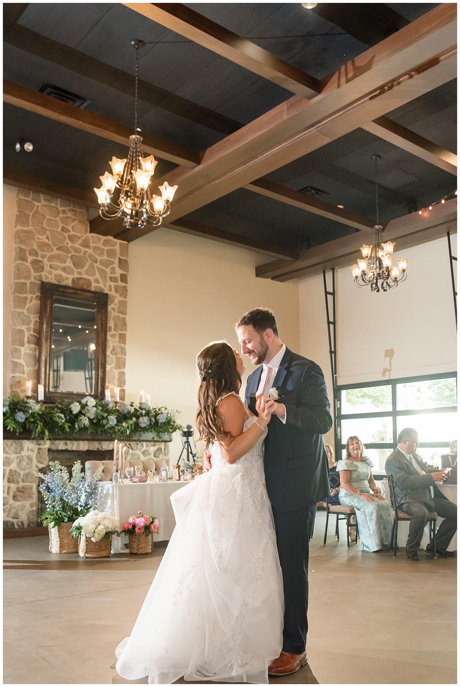 couple sharing their first dance at indoor wedding reception at this Inn at Leola Village Wedding