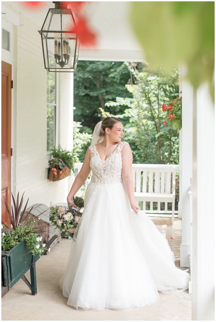 bride walking on front porch looking off to the side