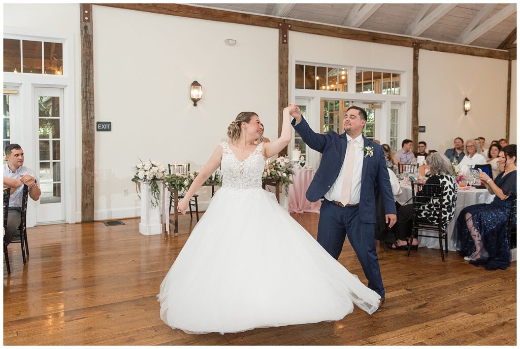 bride and groom choreographed first dance at summer riverdale manor wedding