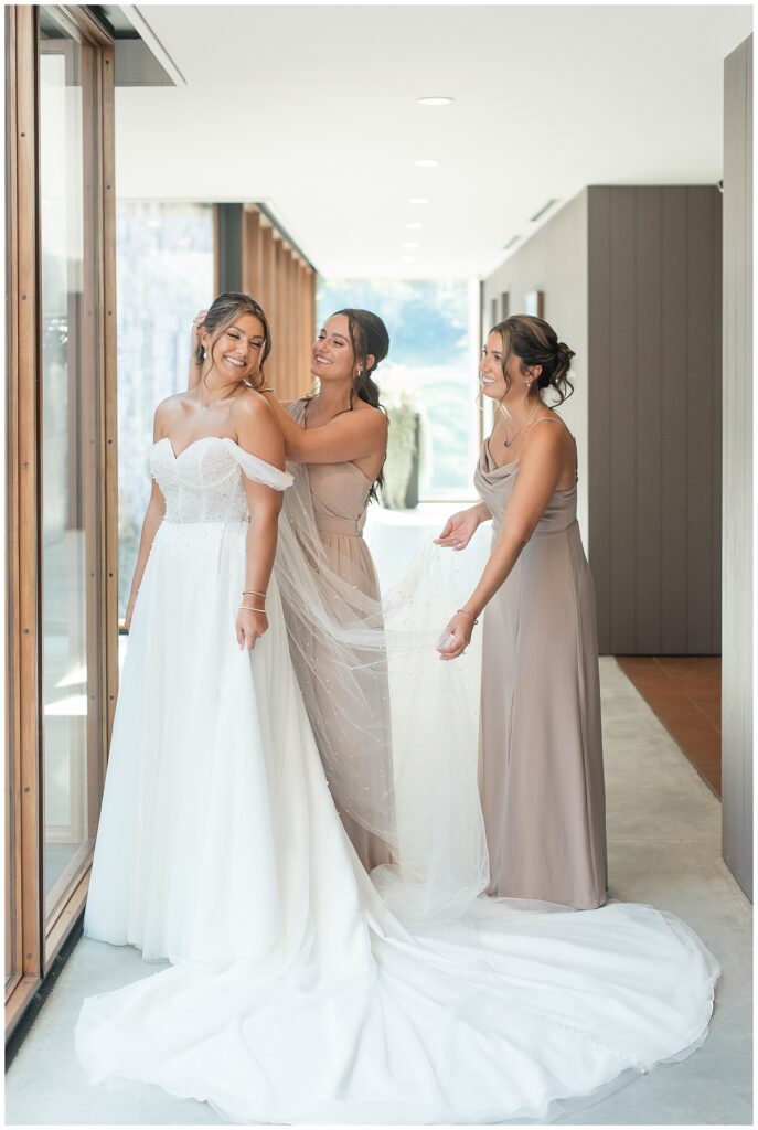 two maids of honor in long champagne colored gowns with bride for this Elizabeth Furnace Fall Wedding in lancaster county