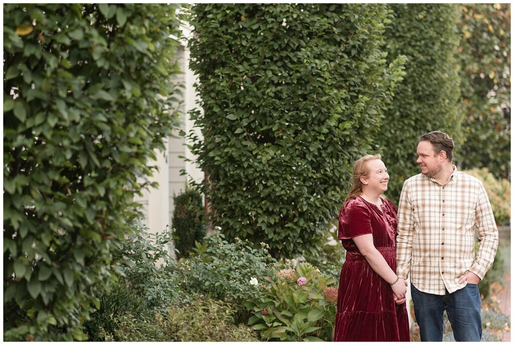 couple standing close and smiling at each other for this Downtown New Hope Engagement Session