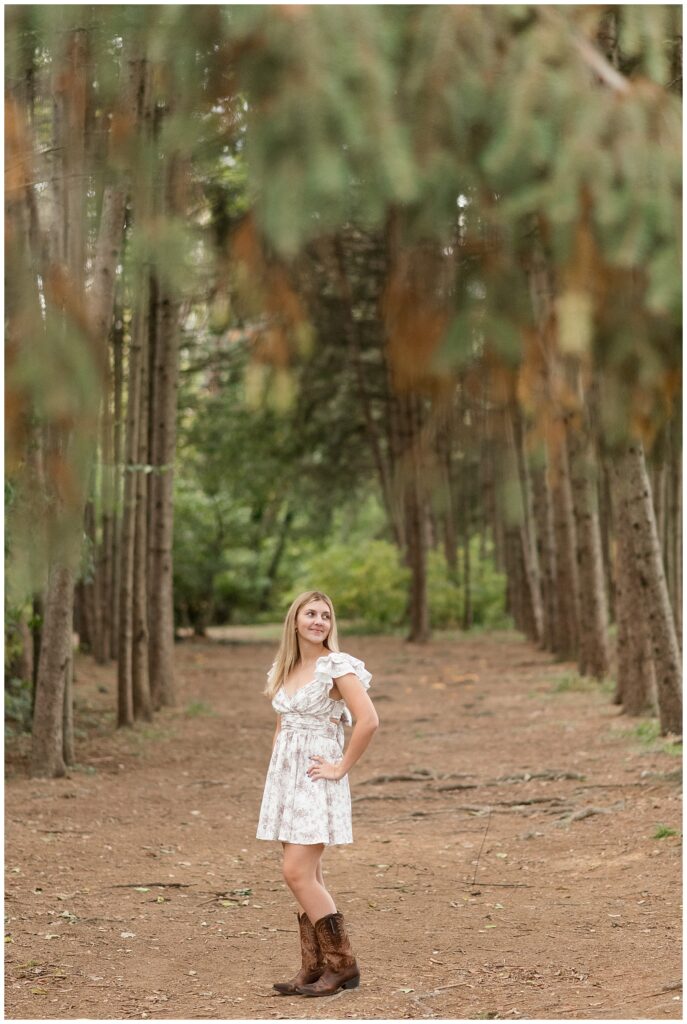 senior girl looking back over her left should for this Fall Overlook Park Senior Session