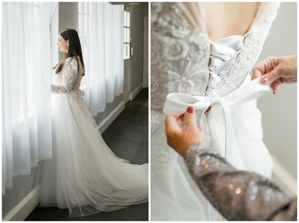 bride looking out of window and also mother of the bride typing bow on the back of bride's gown for this Wedding at The Rotunda at Lauxmont Farms