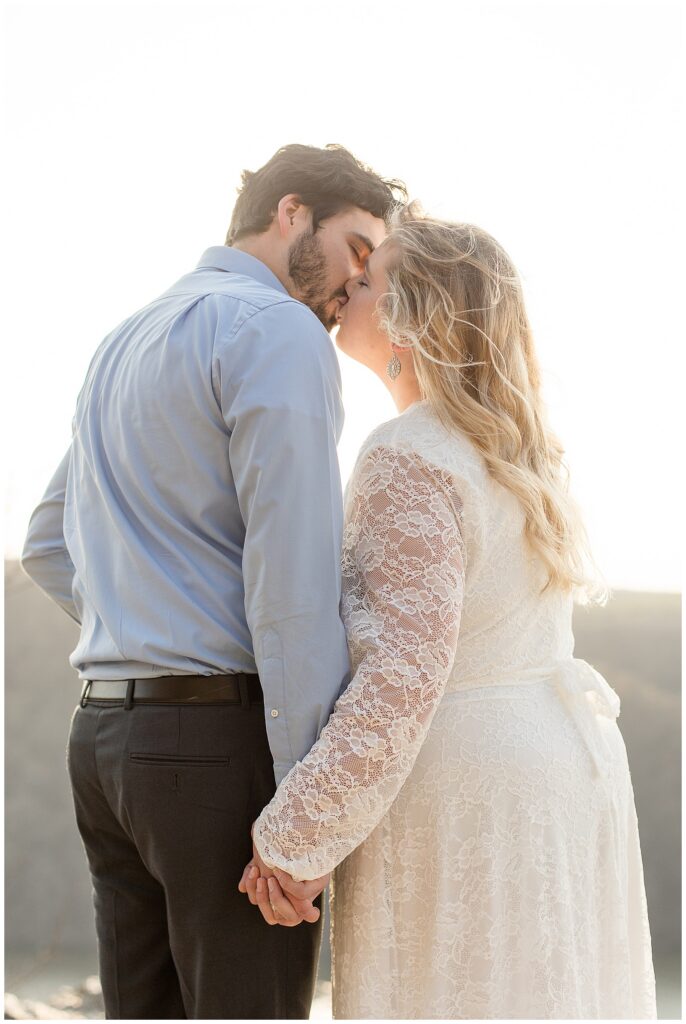 couple kissing at sunset for this Pinnacle Point Spring Engagement Session
