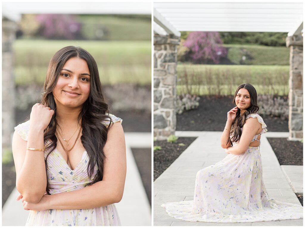 senior girl posing and smiling at camera and also senior girl crouched down by landscaped stone structure for this Spring Masonic Village Senior Session