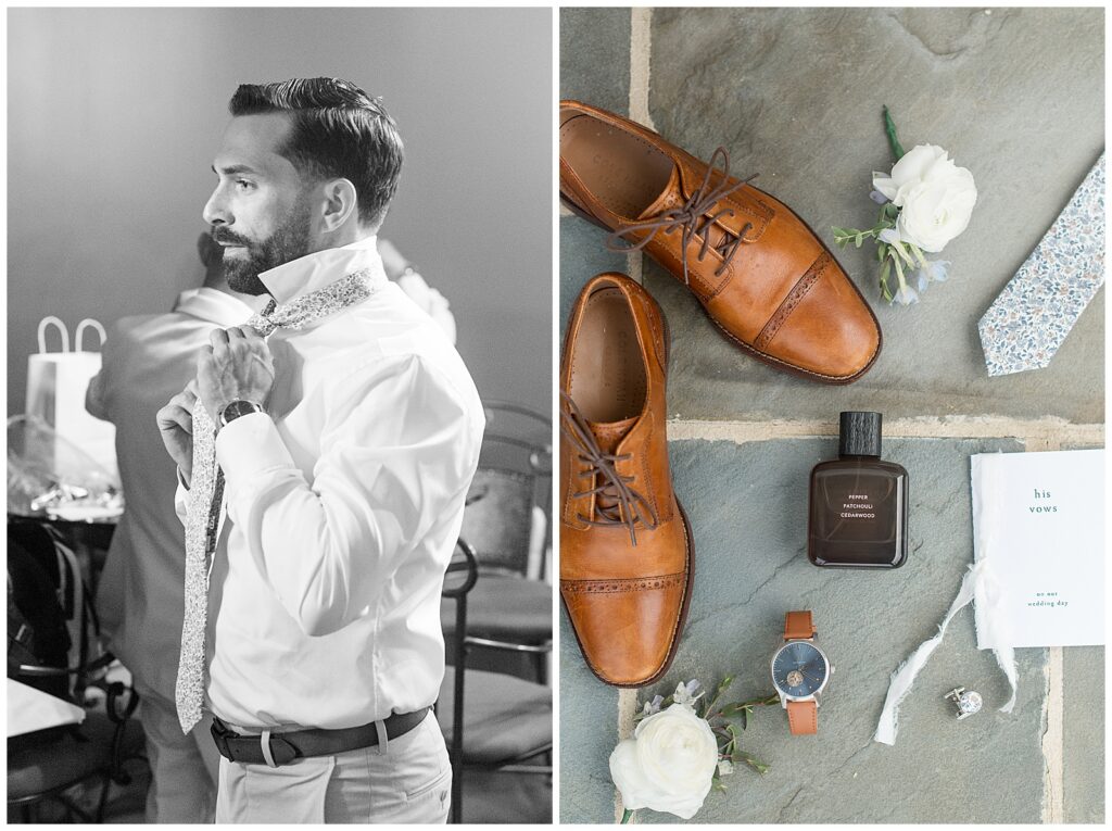 Black and white photo of groom adjusting his floral tie while getting ready for his Bluestone Estate summer wedding | Groom's wedding day flat lay — tan leather oxford shoes, floral tie, white ranunculus boutonniere, cologne, brown leather watch, and his vows booklet | Heather Marie Photography
