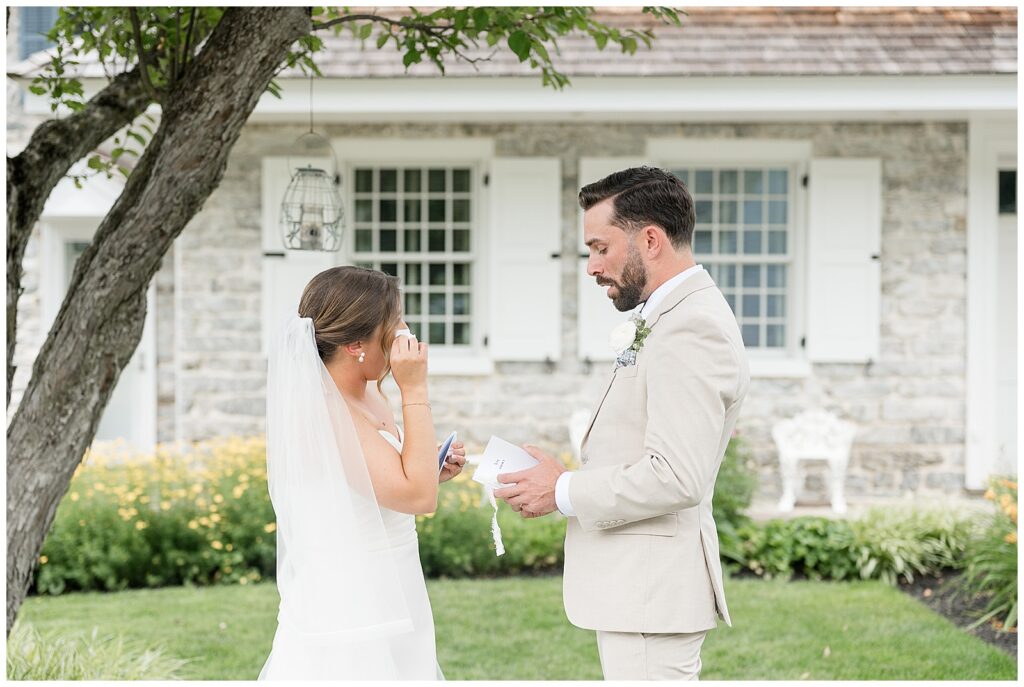 Bride and groom sharing a private vow exchange during their first look at Bluestone Estate, both overcome with emotion | Heather Marie Photography