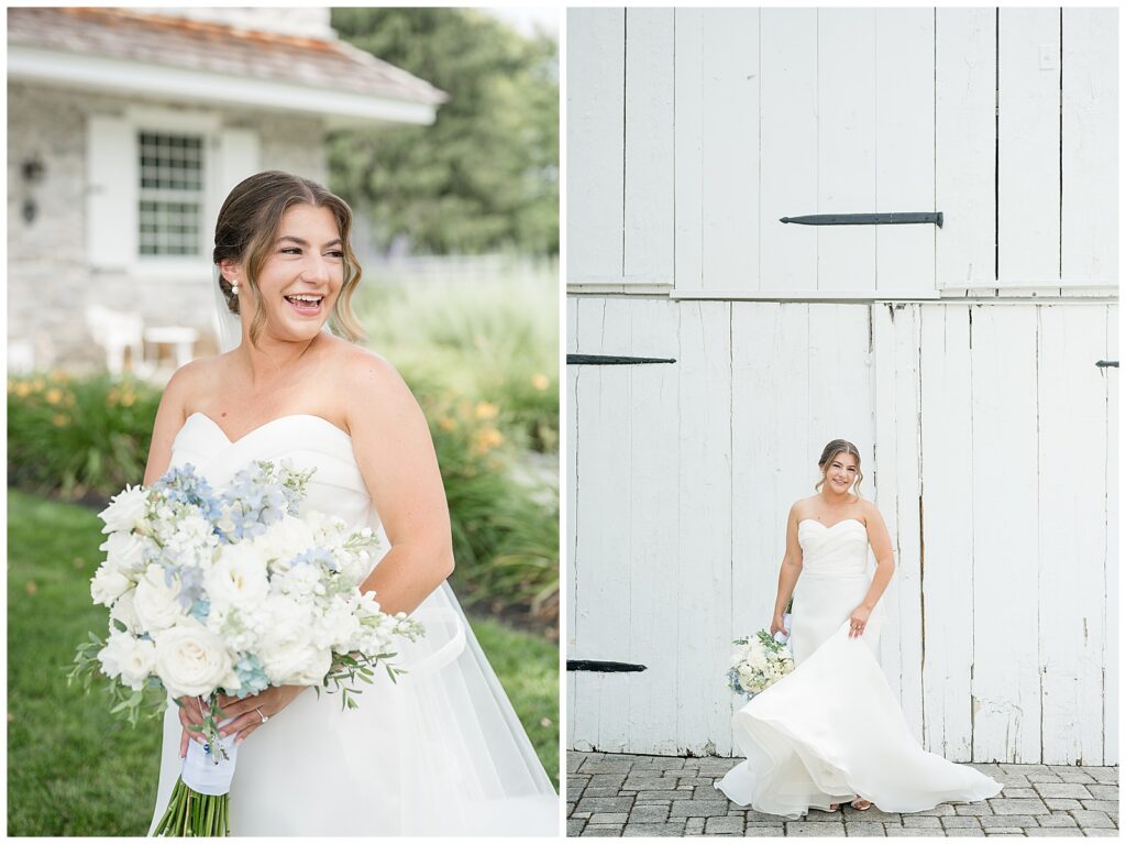 Bride laughing solo portrait holding her white and blue bouquet on the Bluestone Estate grounds // Bride standing in front of the white barn doors at Bluestone Estate summer wedding | Heather Marie Photography