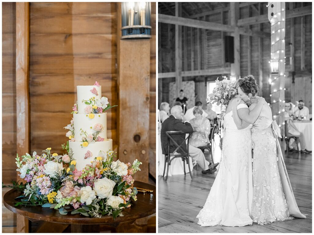 Four-tier white wedding cake decorated with pressed wildflowers surrounded by a lush garden floral arrangement beside a black and white photo of the bride sharing a heartfelt mother-daughter dance with her mom in the Star Barn reception, Heather Marie Photography