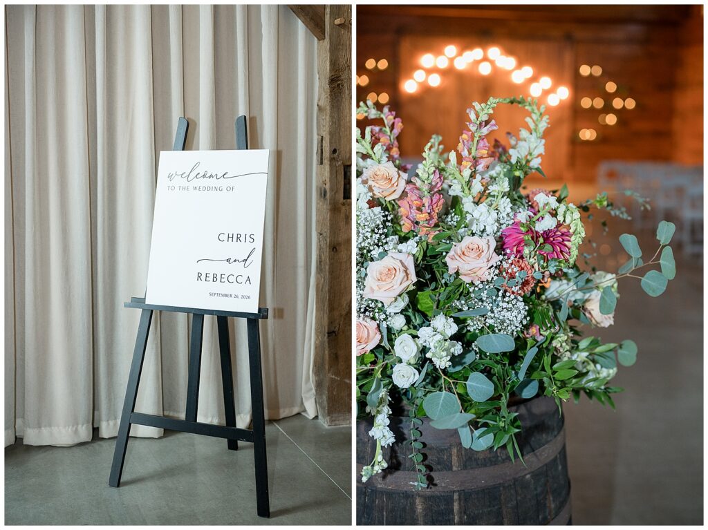 Welcome sign for Chris and Rebecca on a black easel, next to snapdragons, peach roses, and dahlias spilling from a wine barrel inside the ceremony barn